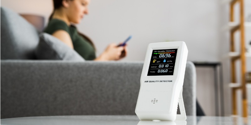 Air quality monitor on table in living room
